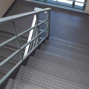 A stairwell made with Wisconsin Plastic Products' embossed flooring